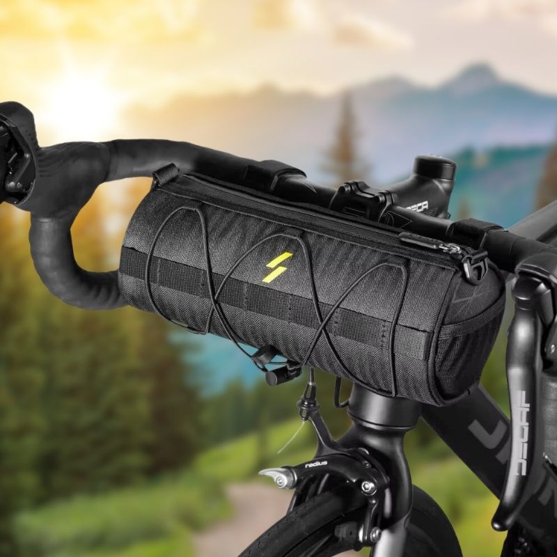 Waterproof front bike bag mounted on MTB handlebar in outdoor setting