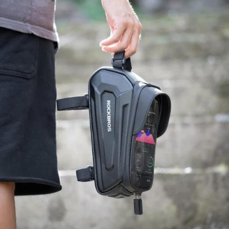 RockBros phone bag carried by hand showing compact portable design
