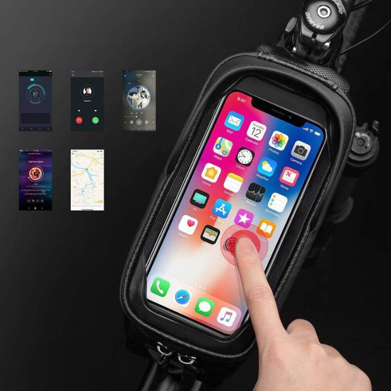 Cyclist interacting with smartphone through waterproof touchscreen bike bag