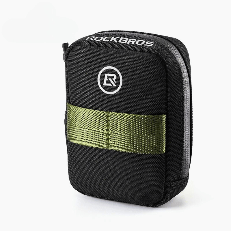 Compact saddle bag mounted under a green city bike saddl