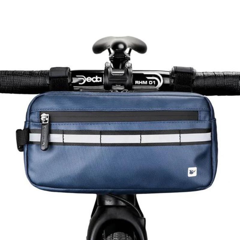 Blue waterproof bike handlebar bag centered on front bar, ready for adventure