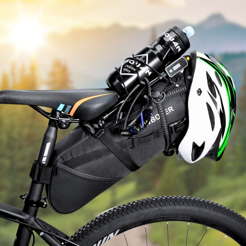 Waterproof 10L bike saddle bag mounted on MTB with helmet and bottle attached
