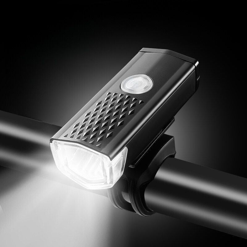 Front light installed on handlebar, shining brightly