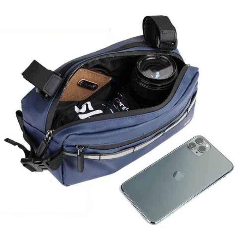 Cyclists using handlebar bags during daily ride for essentials and safety
