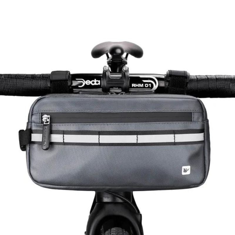 Gray waterproof bike handlebar bag centered on front bar, ready for adventure