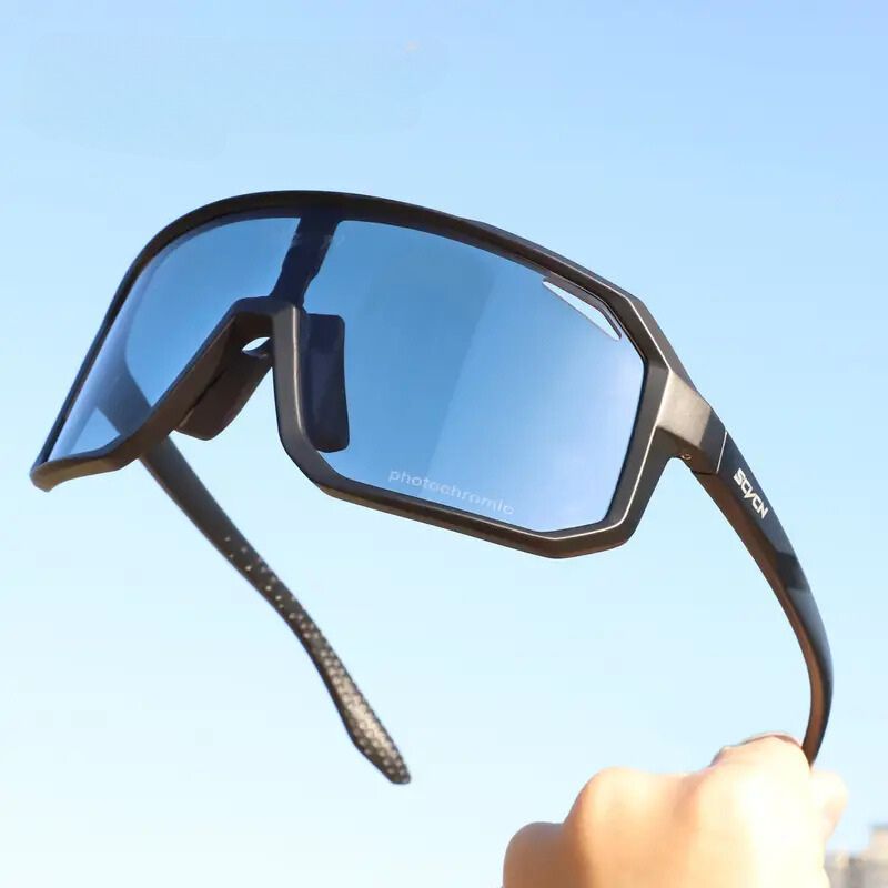 Lightweight blue cycling glasses suspended in air