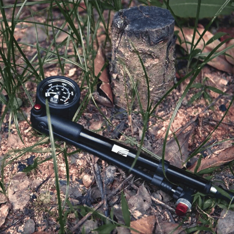 Mountain bike shock pump on trail – portable and accurate