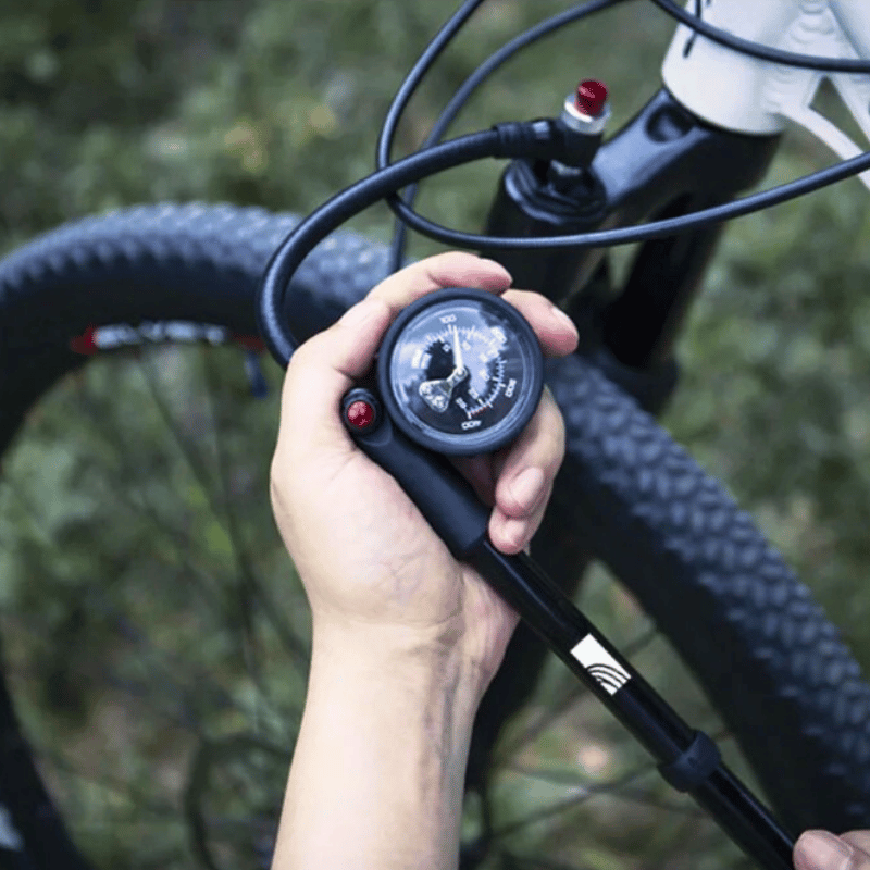 Durable CNC aluminium shock pump with 2-stage leak-free head, designed for easy carry and fast fork or shock inflation.

