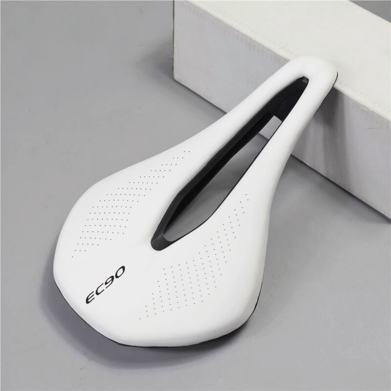 White ultralight bike seat with central cutout for road and MTB bikes – breathable and ergonomic design

